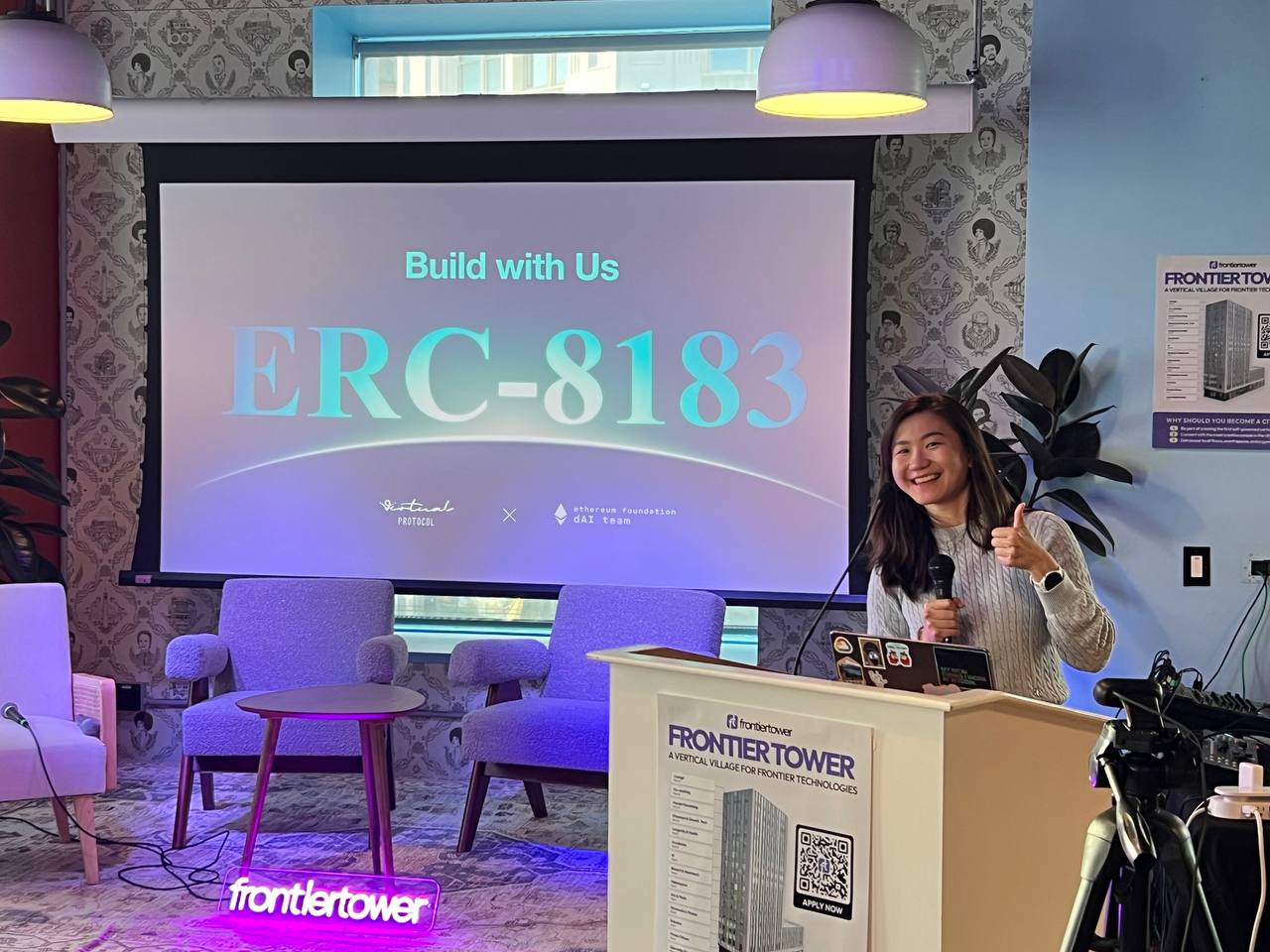 Celeste Ang speaking about agent systems at Frontier Tower